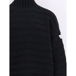 Wool blend sweater with distressed effect