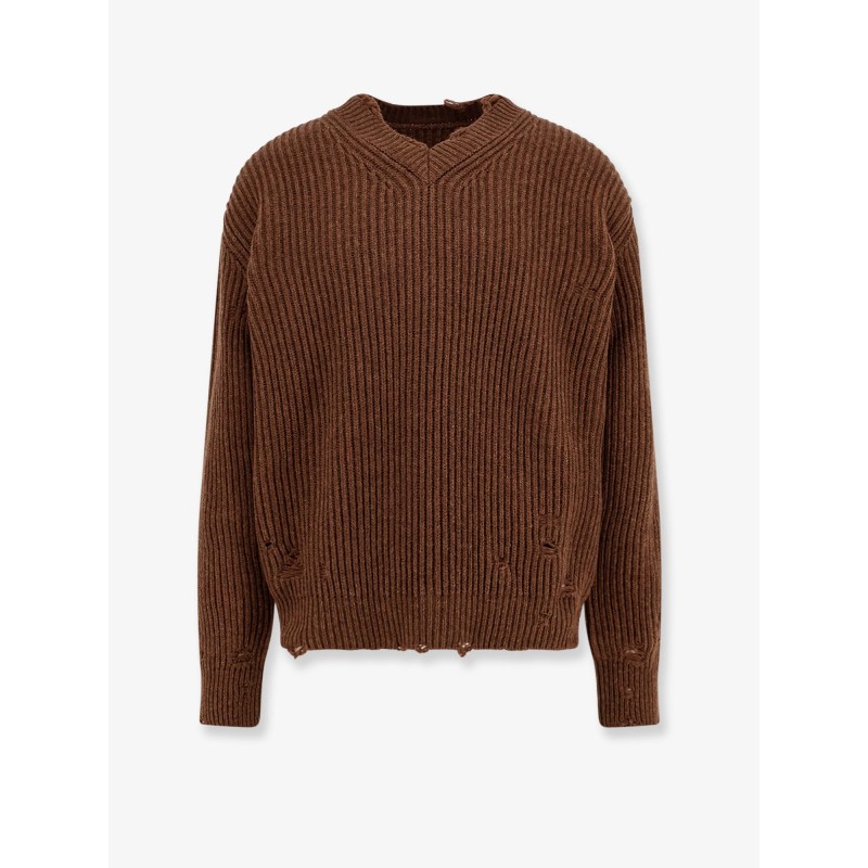 Wool blend sweater with distressed effect