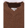 Wool blend sweater with distressed effect