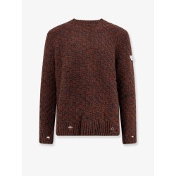 Wool blend sweater with distressed effect
