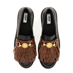MOCCASIN WITH BANGS AND COIN