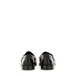 MOCCASIN WITH BANGS AND COIN
