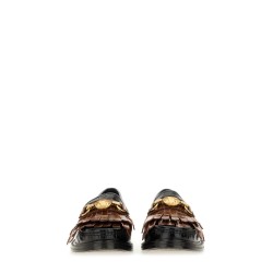 MOCCASIN WITH BANGS AND COIN