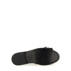 MOCCASIN WITH BANGS AND COIN
