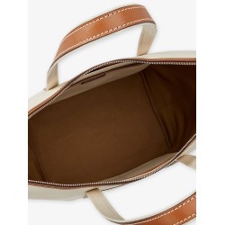 Canvas travel bag with leather profiles
