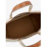 Canvas travel bag with leather profiles