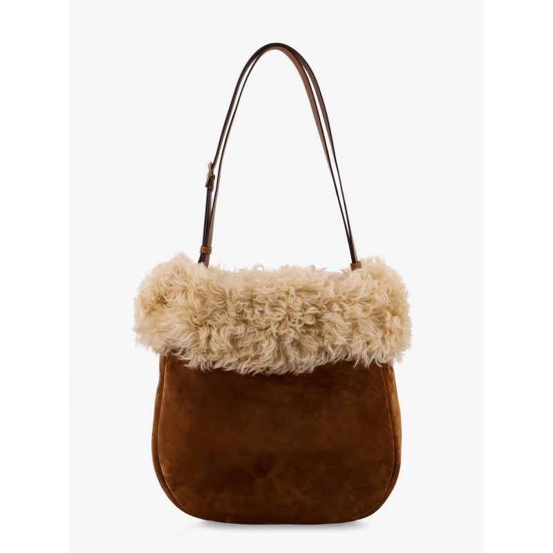 Suede shoulder bag with shearling profile