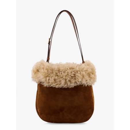 Suede shoulder bag with shearling profile