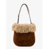 Suede shoulder bag with shearling profile