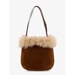 Suede shoulder bag with shearling profile