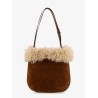 Suede shoulder bag with shearling profile