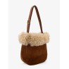 Suede shoulder bag with shearling profile