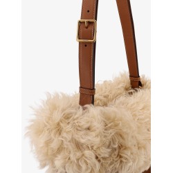 Suede shoulder bag with shearling profile