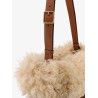 Suede shoulder bag with shearling profile