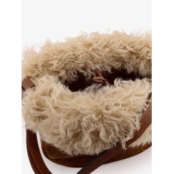 Suede shoulder bag with shearling profile