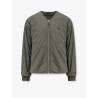 Nylon jacket with metal logo patch on the front