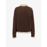 Reversible nylon and faux shearling bomber jacket