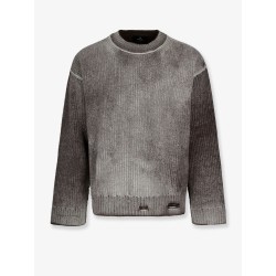 Reversible wool sweater with destroyed effect