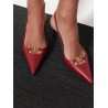 Leather decolletè slingback with metal logo