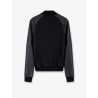 Wool jacket with leather sleeves