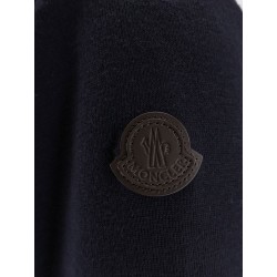 Nylon down jacket with wool sleeves