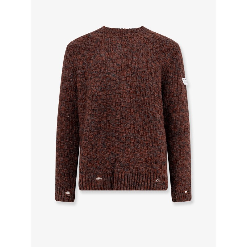 Wool blend sweater with distressed effect