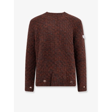 Wool blend sweater with distressed effect