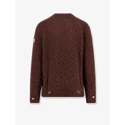 Wool blend sweater with distressed effect