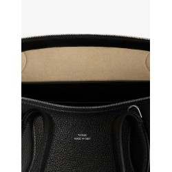 Leather handbag with engraved logo on the front