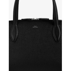 Leather handbag with engraved logo on the front