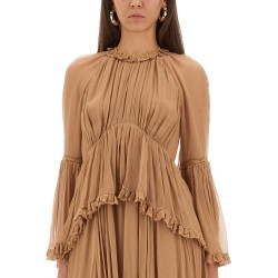 "HYPNOTIC PEPLUM" RUFFLE DRESS