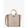 Chloé Carry canvas crossbody bag with oversized logo on the front