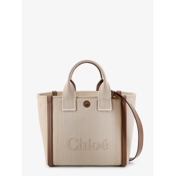 Chloé Carry canvas crossbody bag with oversized logo on the front