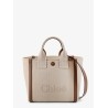 Chloé Carry canvas crossbody bag with oversized logo on the front