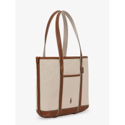 Canvas shoulder bag with embroidered logo on the front