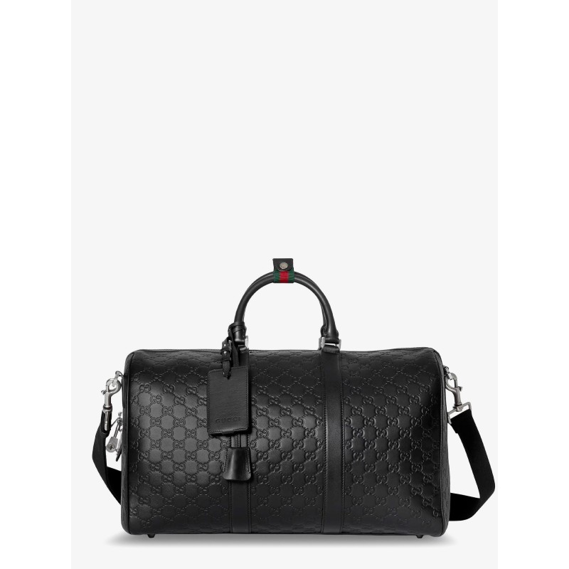 Coated canvas GG Emblem travel bag with GG motif
