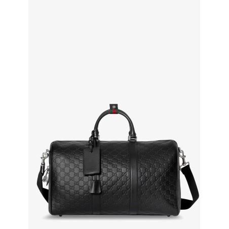 Coated canvas GG Emblem travel bag with GG motif