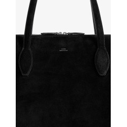 Suede handbag with engraved logo on the front