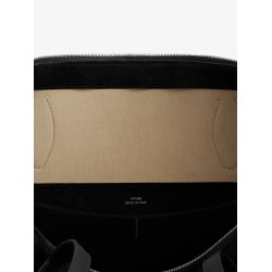 Suede handbag with engraved logo on the front