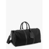 Nylon duffel bag with leather inserts