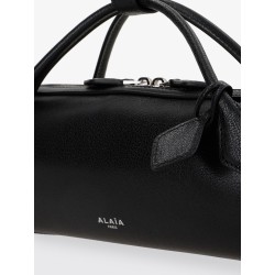 Le Teckel suede clutch bag