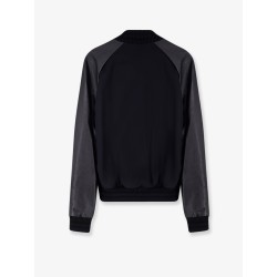 Wool jacket with leather sleeves