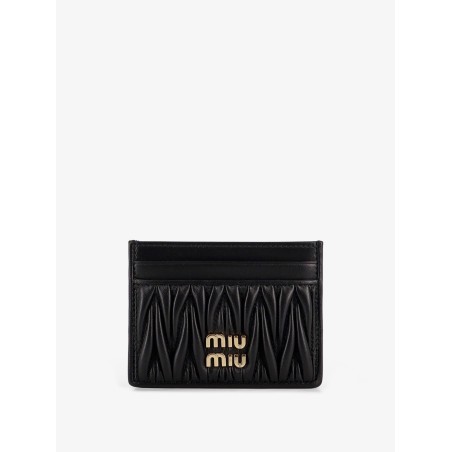 Quilted leather card holder with metal logo