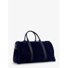 Suede travel bag with engraved logo on the front