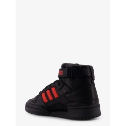 Leather sneakers with iconic logo on the side