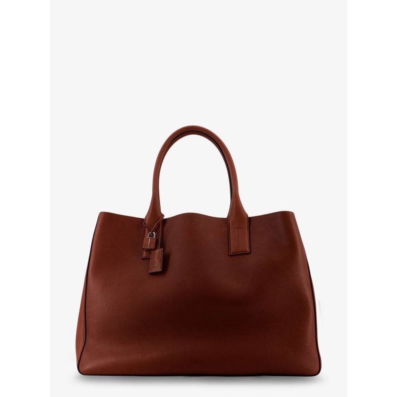 Hammered leather handbag with engraved logo on the front