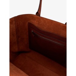 Hammered leather handbag with engraved logo on the front