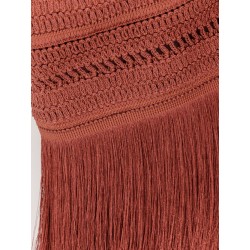 Asymmetrical top with fringes