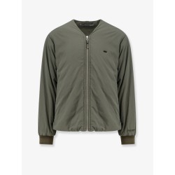 Nylon jacket with metal logo patch on the front