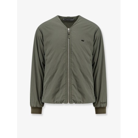 Nylon jacket with metal logo patch on the front